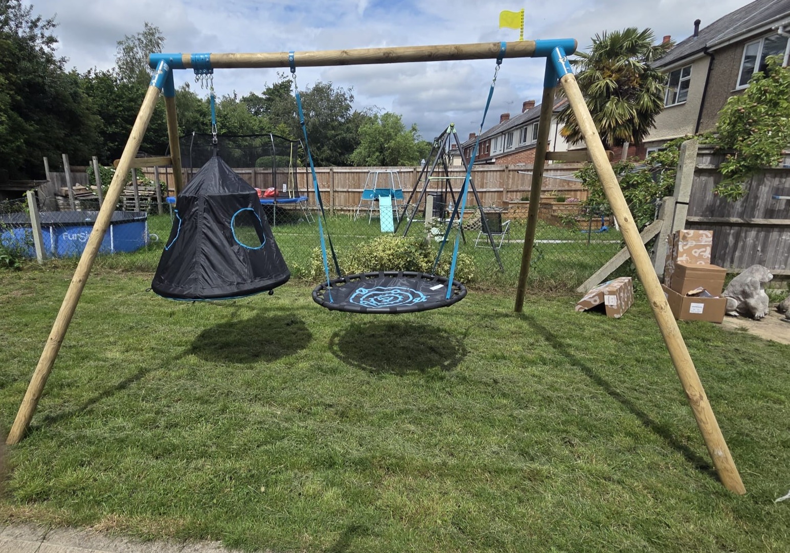 Fully repaired, stained and safely anchored garden play set transformation
