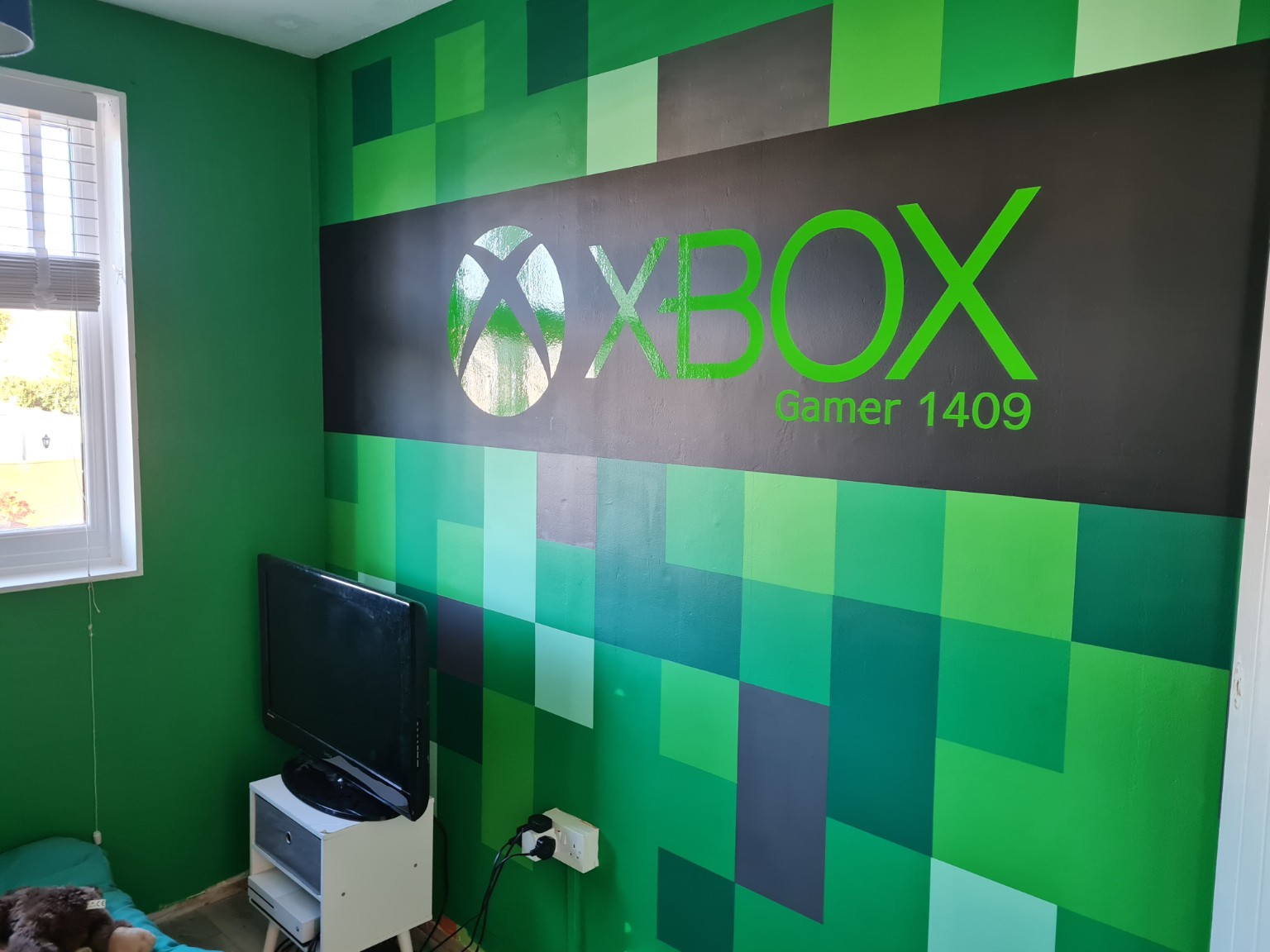 Finished custom Xbox media feature wall by KR Handyman Services Ltd